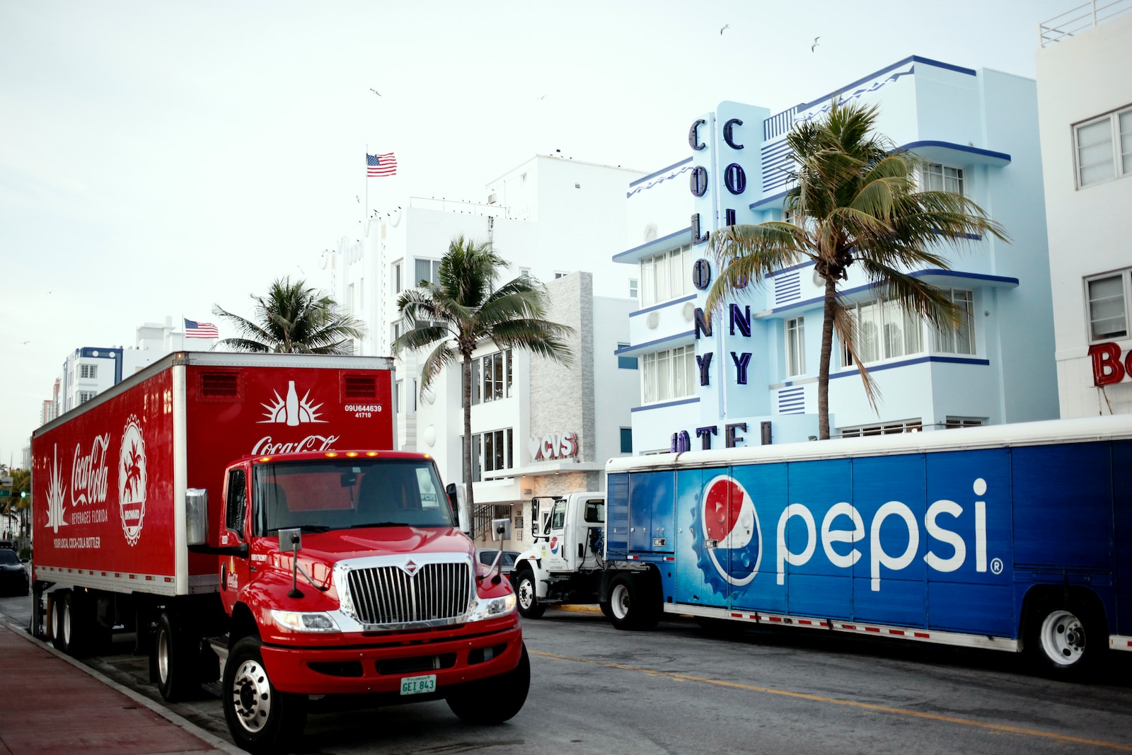 red and white ford truck on road during daytime